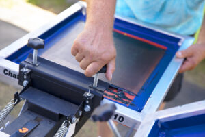 Closeup of Vastex manual decorated apparel screen printing press