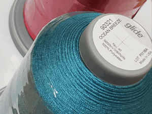 Machine embroidery thread with thickness specification