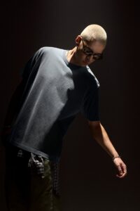Male model wearing the BELLA+CANVAS Washed Collection