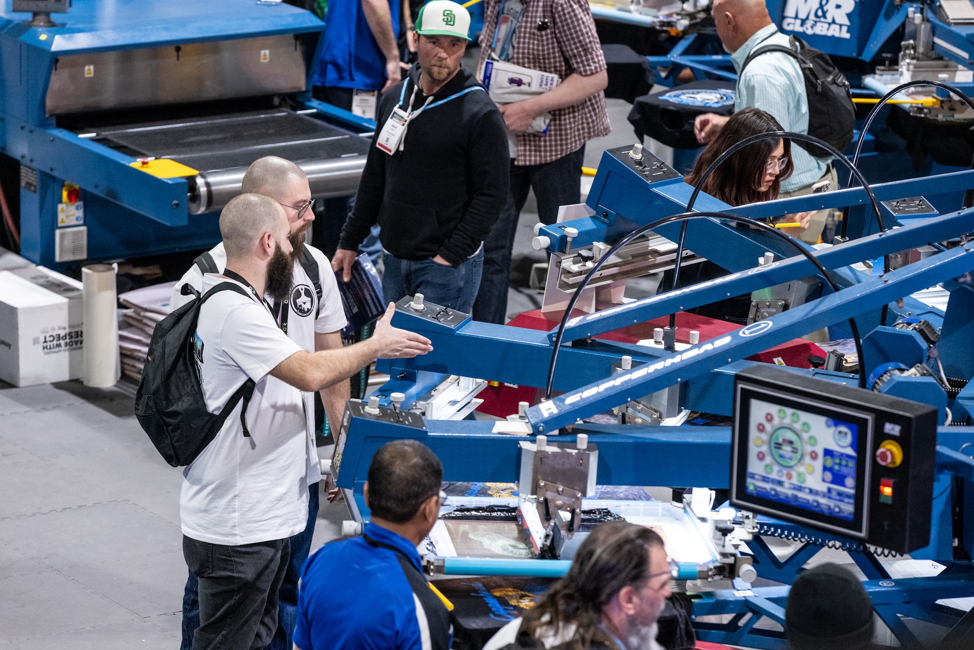Automatic T-shirt screen printing machine Impressions Expo