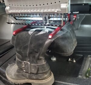 Commercial custom embroidery clamping system