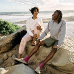 Allmade Unisex Organic CVC Fleece Crewneck Sweatshirt in neutral color, part of the sustainable C-FREE® program, photographed outdoors.