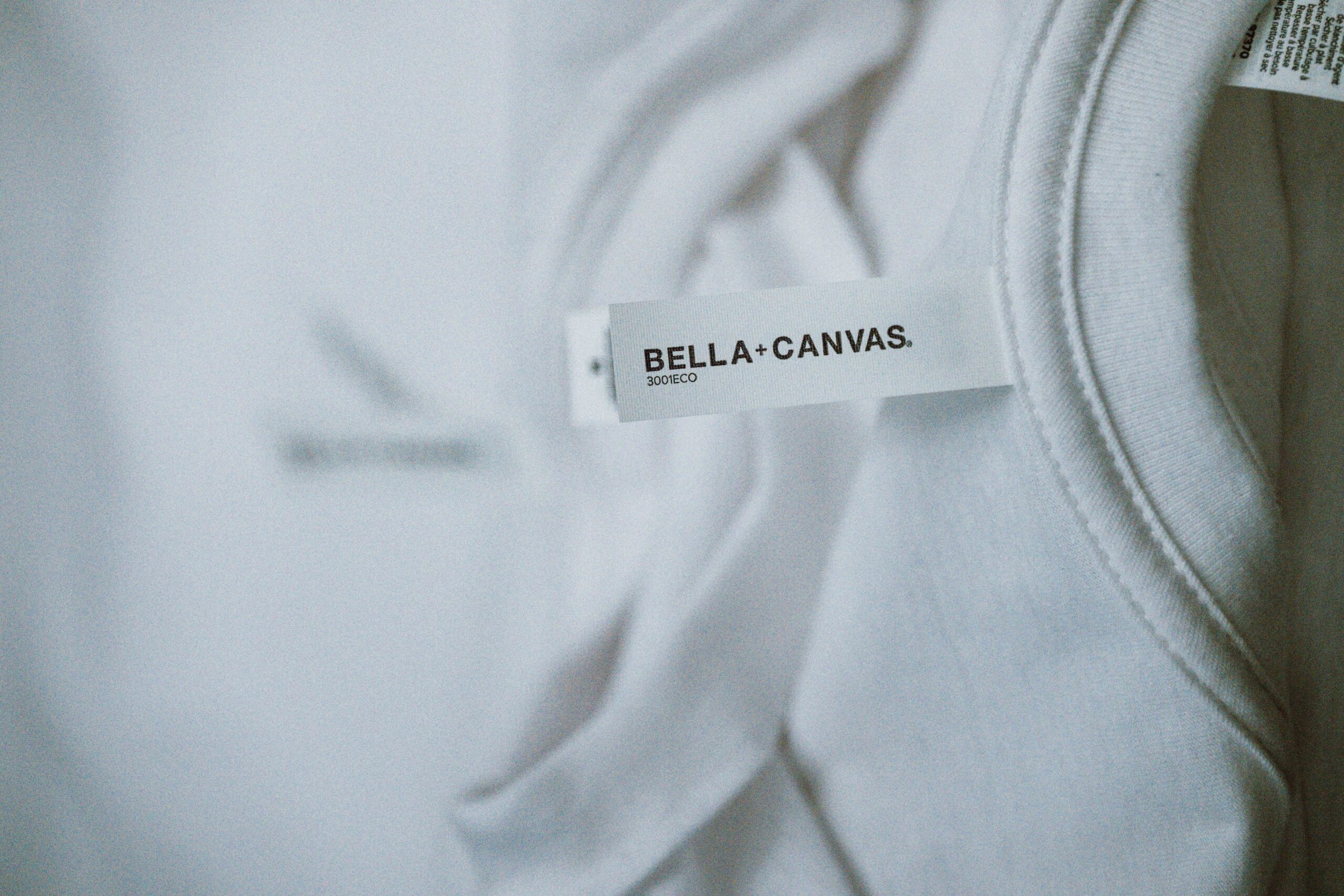 BELLA+CANVAS white T-shirt label