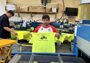 Spectrum Designs screen printing production worker