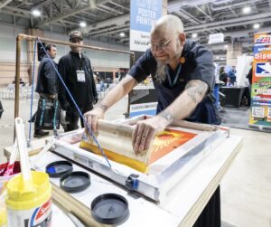 Impressions Expo 2025 Ink Kitchen Brian Potash live poster printing