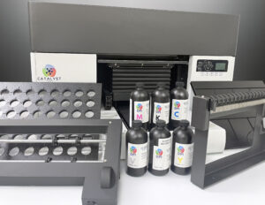 Compact UV printing system with rotary and roll printing options