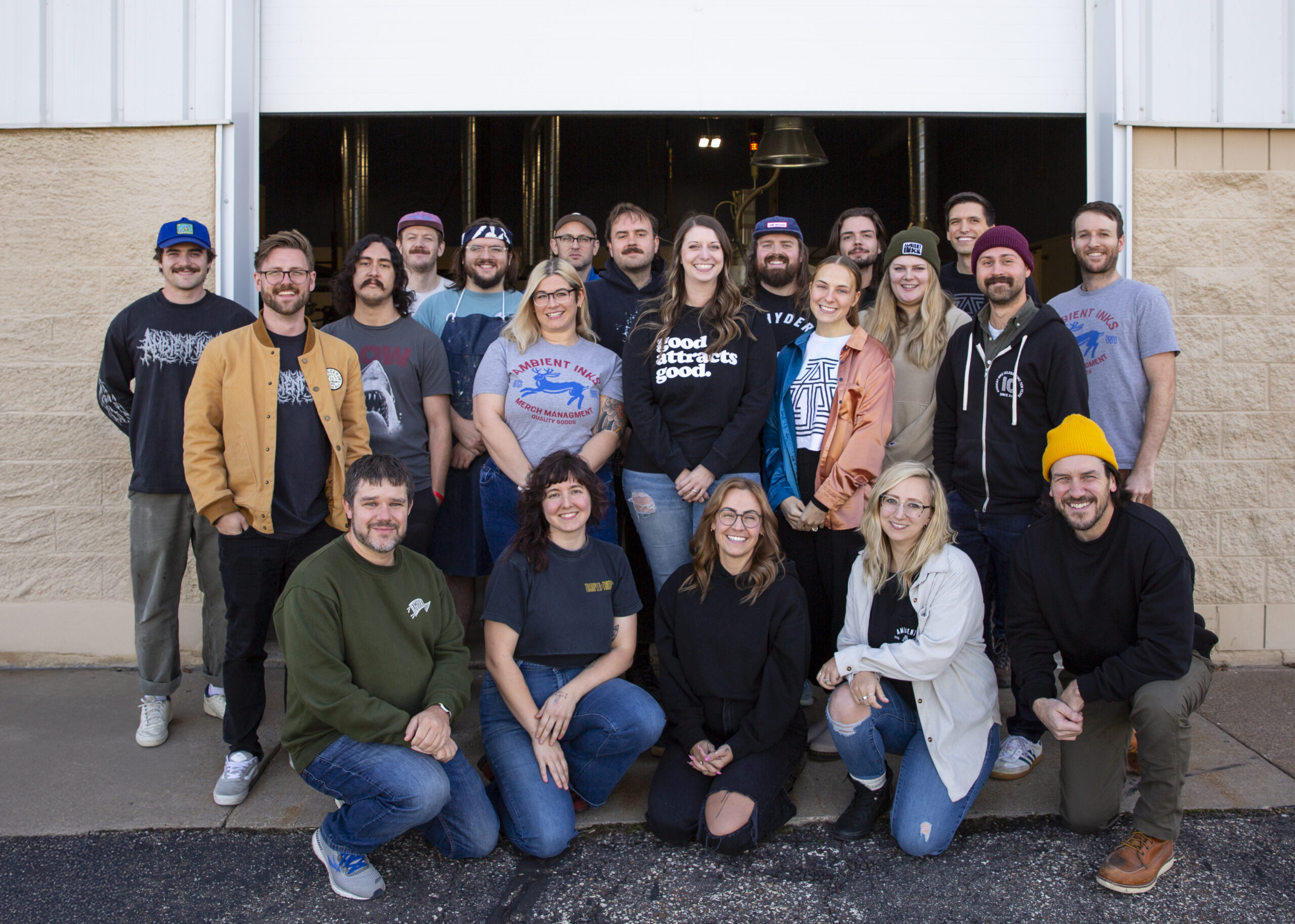 Mikala Meidl of Ambient Inks stands in front of screen-printing equipment at her Wisconsin print shop.