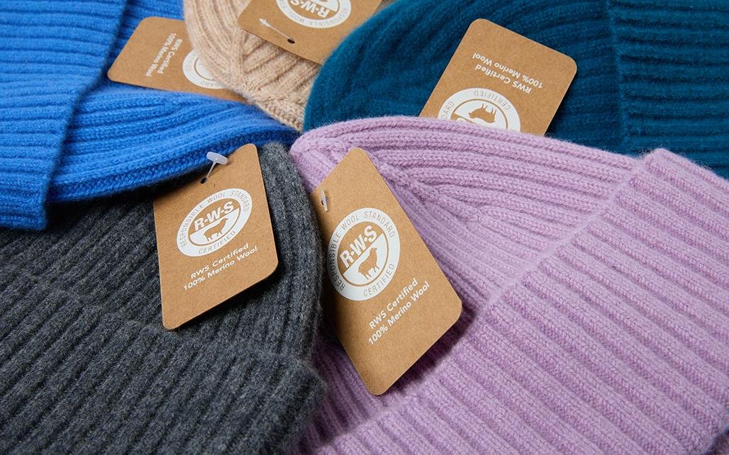Assorted Foremost Hat beanies in neutral and earth tones