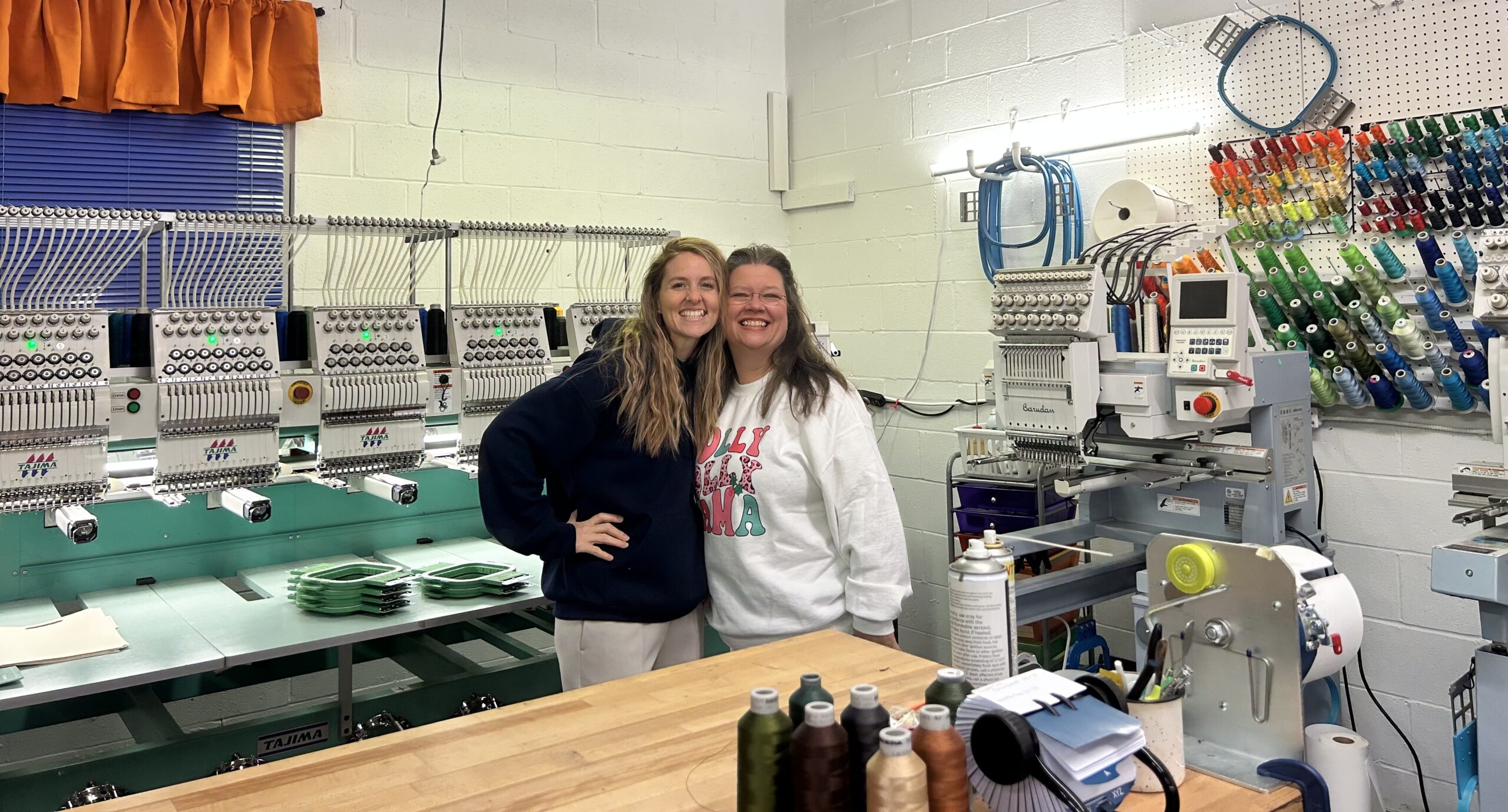 Graphic Reflections’ founder Sheri Blackiston (right) and her operations manager Amanda Patterson