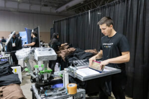 Live T-shirt screen printing activation at Impressions 2026 decorated apparel industry Expo at Atlantic City