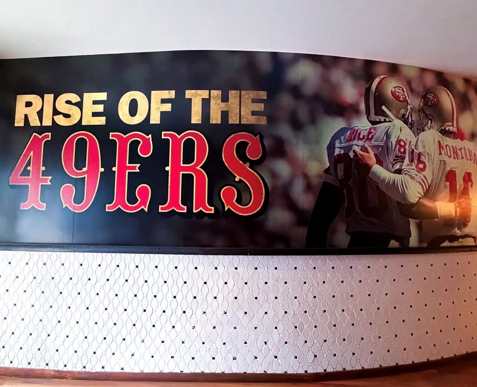 San Francisco 49ers wall graphic printed by VIVAS Inc. using Roland DG TrueVIS AP-640 latex printer for pre-Super Bowl event.