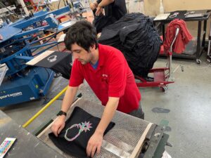 Worker with disabilities at decorated apparel company Spectrum Designs