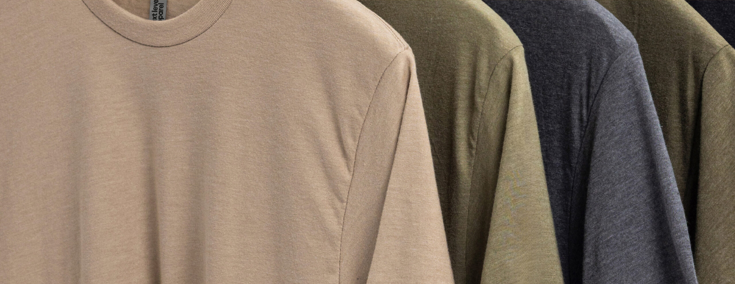 Next Level Apparel premium blank T-shirts highlighting cotton sourcing and supply chain traceability