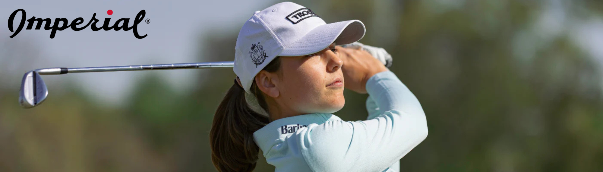 LPGA professional Benedetta Moresco wearing Imperial golf headwear during a swing as part of Imperial’s new athlete ambassador partnership