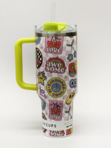 Custom-printed Stanley Cup tumbler produced on the Inkcups Helix High Throw UV Cylindrical Printer featuring full-color 360-degree graphics on a handled drinkware product.