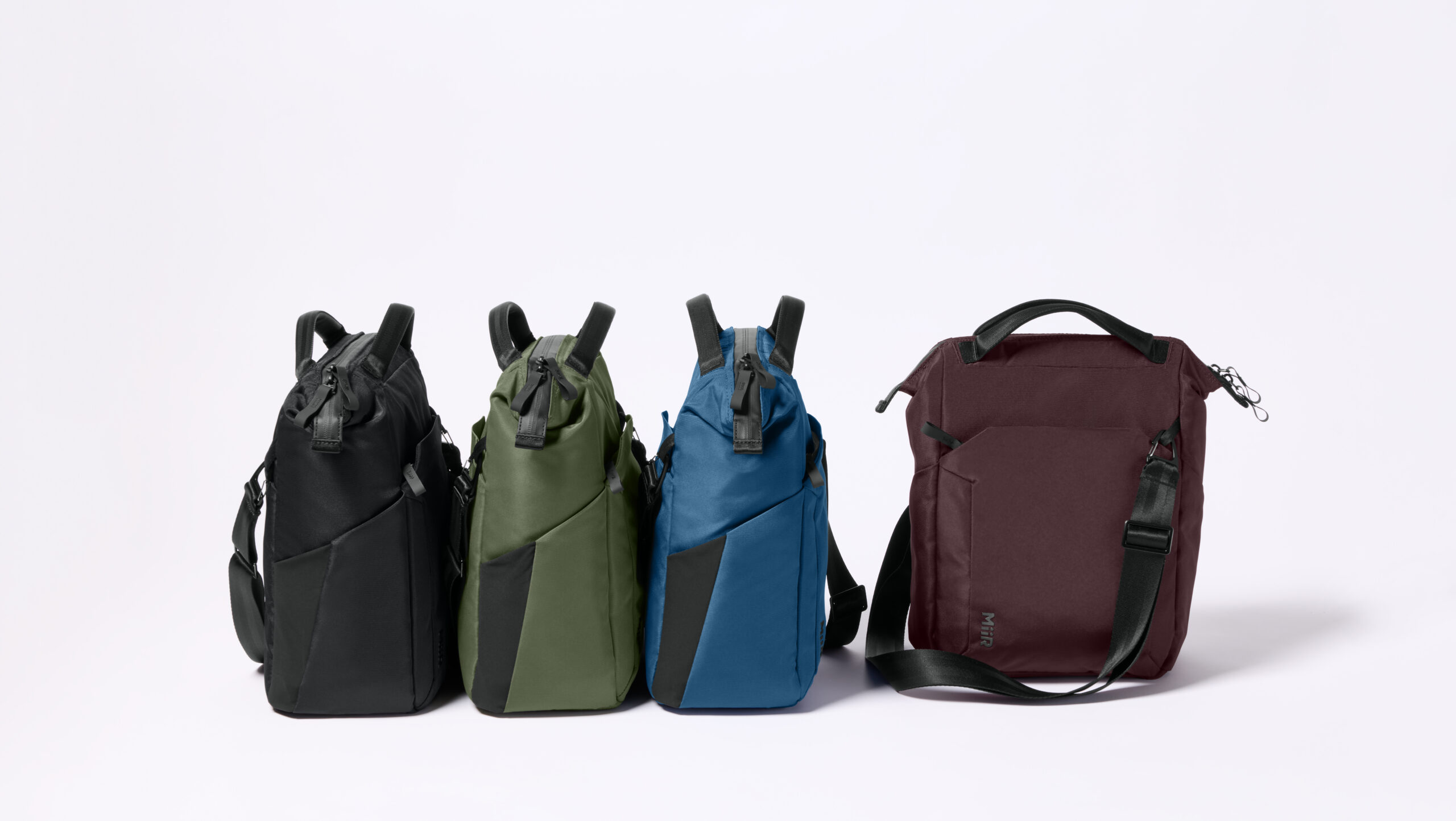MiiR premium tote bags and carry accessories available through SanMar's new wholesale partnership for branded merchandise, corporate apparel and promotional products.