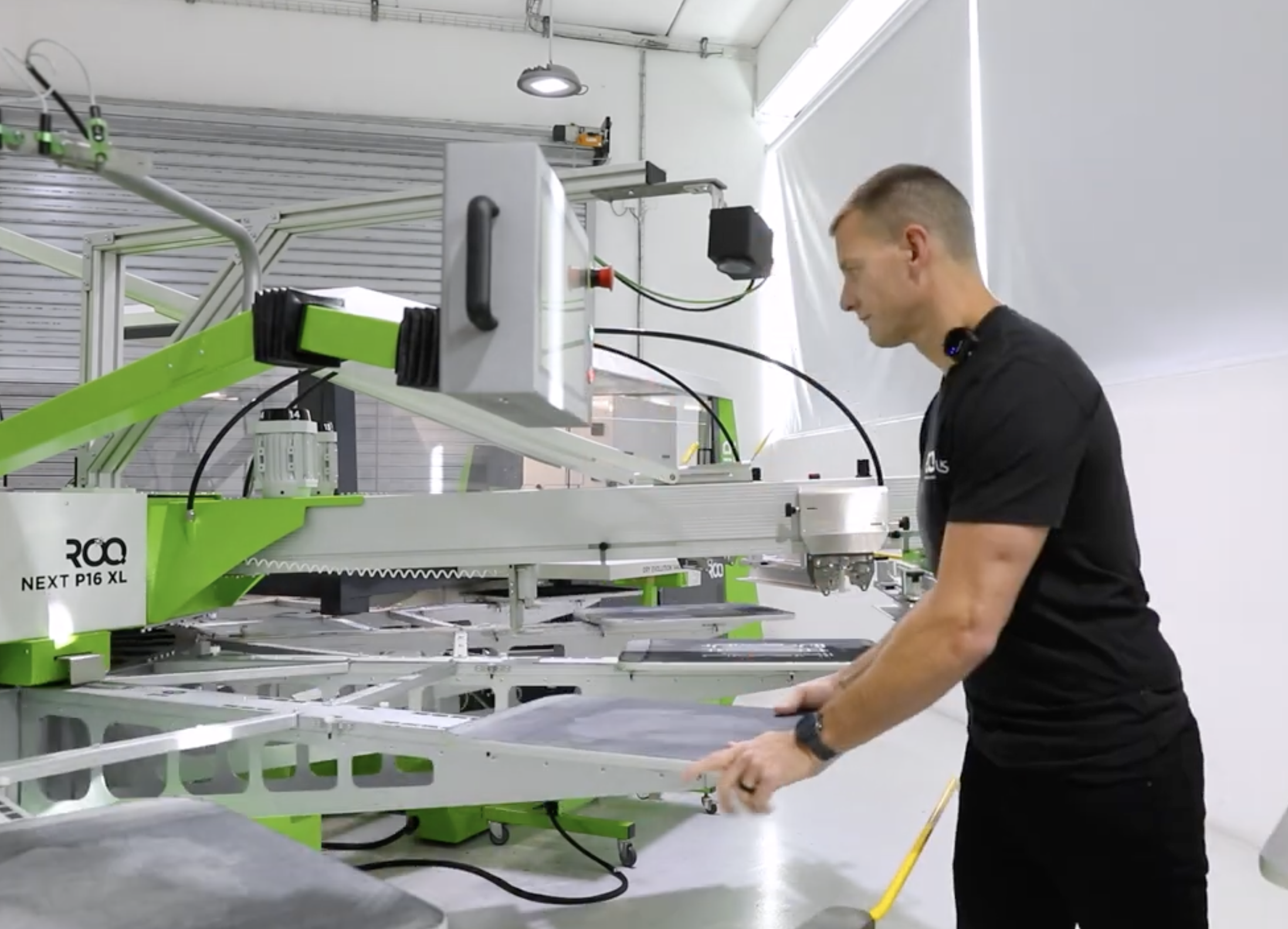 ROQ decorated apparel Screen-printing Press Pallet Unload Feature
