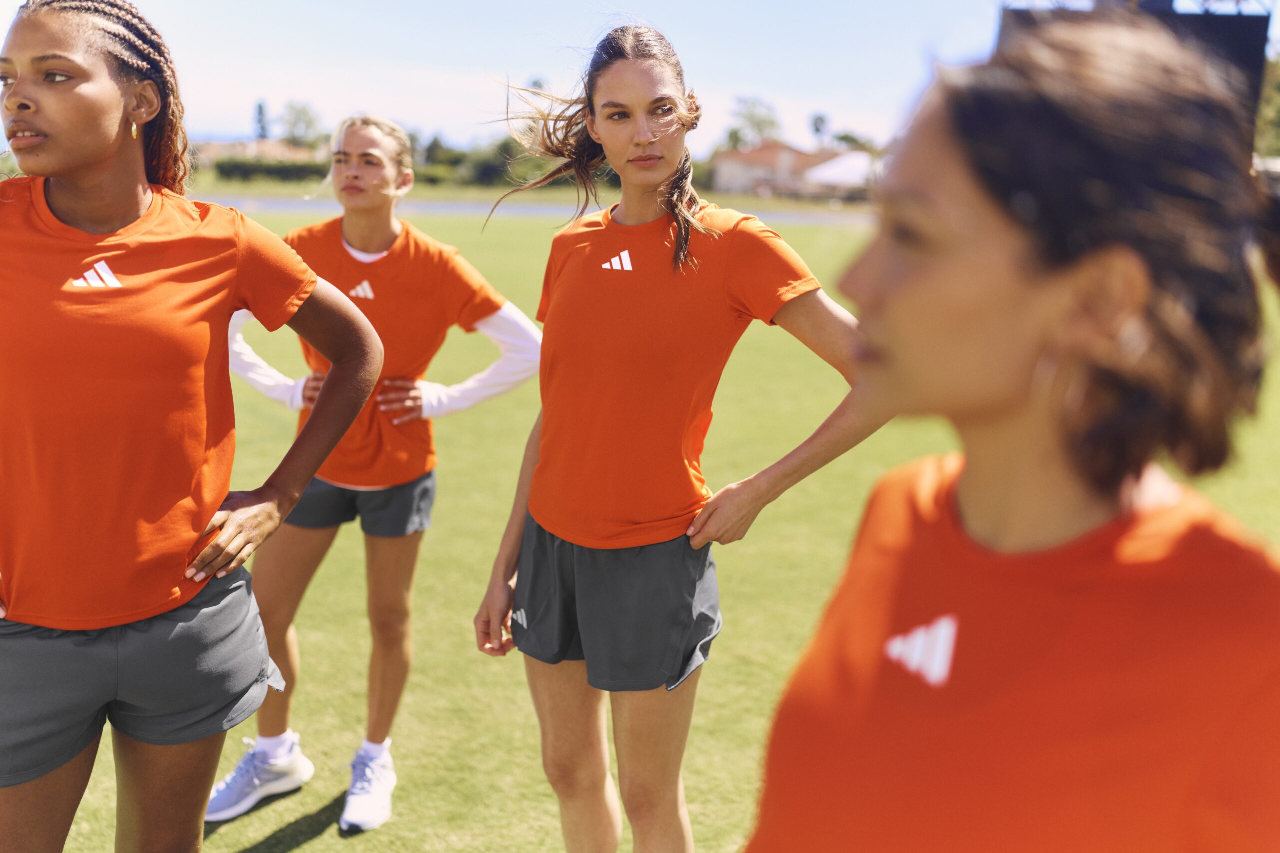 Athletes wearing adidas team apparel available through S&S, the exclusive U.S. wholesale distributor for adidas teamwear, school athletics, and branded merchandise.