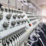 Embroidery machines in a custom commercial embroidery shop
