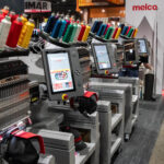 Melco commercial single-head embroidery machines configured for multi-machine apparel production