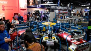 M&R screen printing press Impressions Expo Long Beach, California