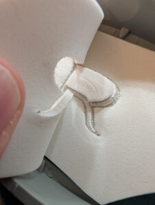 Removing excess foam 3D puff embroidery 